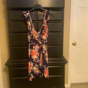 Francesca’s sz med navy, multi colored floral, faux wrap dress.